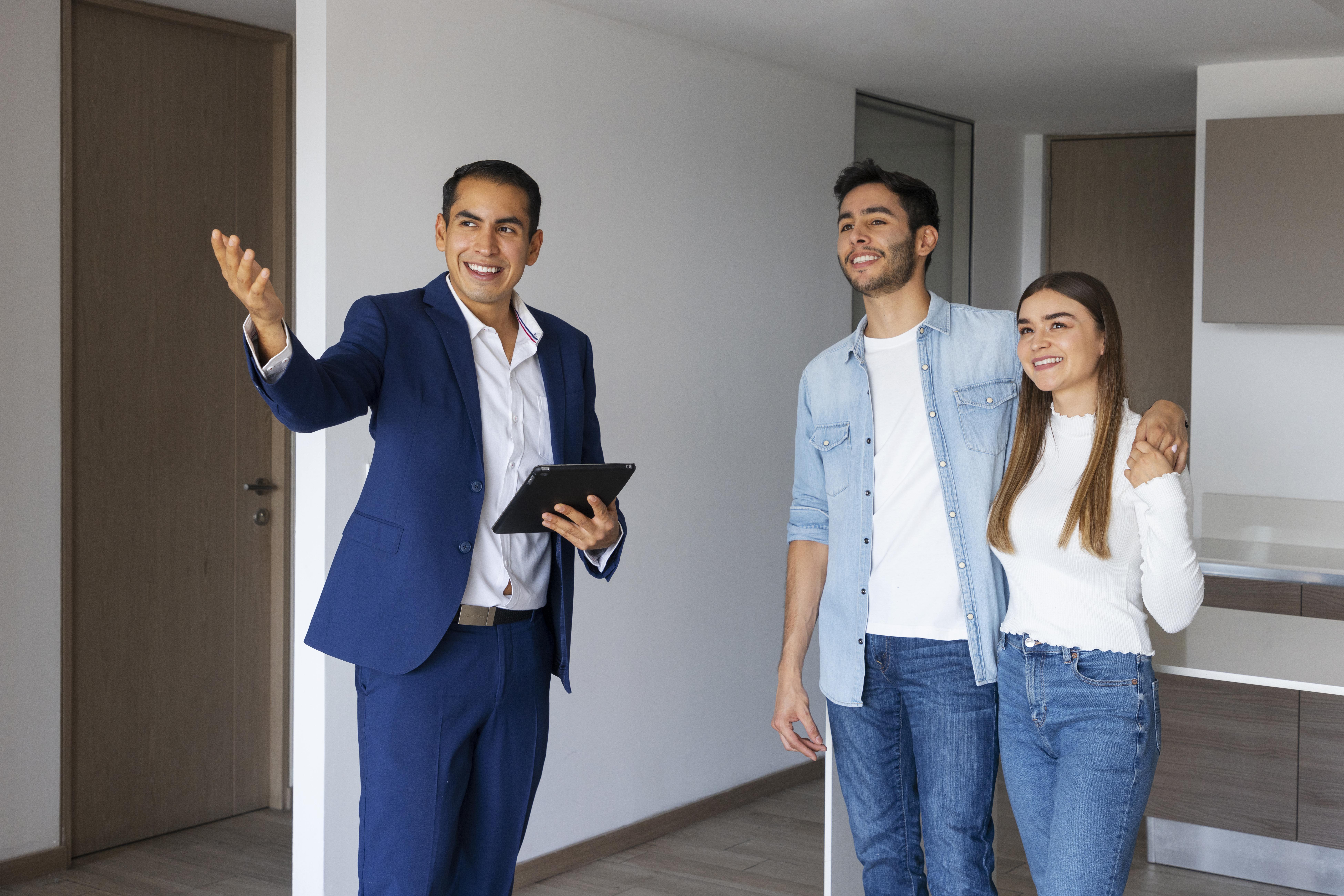 Home Medium Shot Couple Talking Real Estate Agent