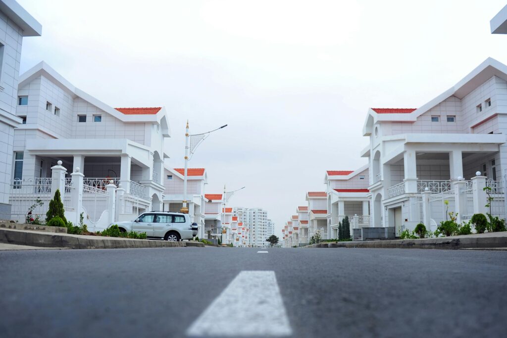 pexels photo 1475938 1475938 Modern luxury houses line a calm street in Ashgabat, Turkmenistan.